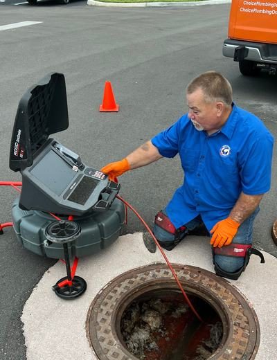 Choice Plumbing Orlando sewer camera inspection at manhole