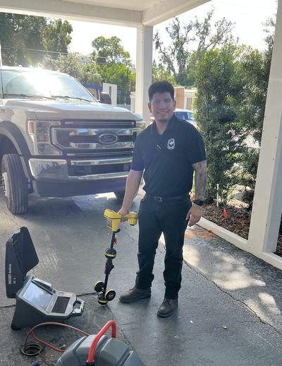 Choice Plumbing Orlando technician with line locator detection equipment
