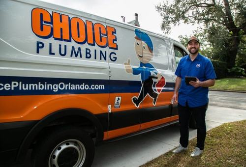 Choice Plumbing Orlando technician with branded service van