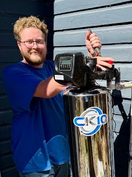 Choice Plumbing technician installing CK10 stainless steel water filtration system