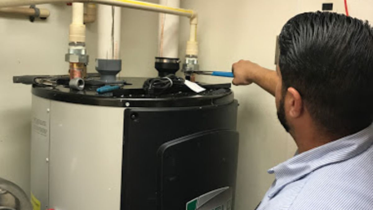 Plumber installing a water heater purchased elsewhere