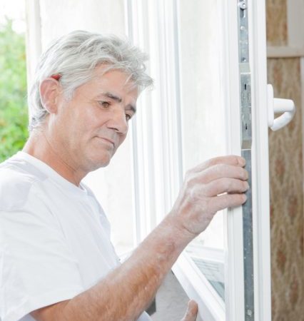 Homeowner Preparing for Hurricane