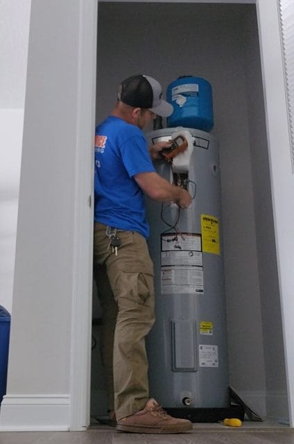 Plumber in Winter Garden FL diagnosing a no hot water problem